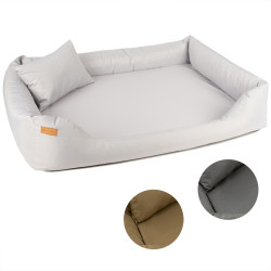 Cama sofá  para un perro con una almohada y un colchón cómodo